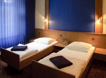 Фото номера Двухместный номер с 2 отдельными кроватями Отель Hotel Victoria г. Щецин 8