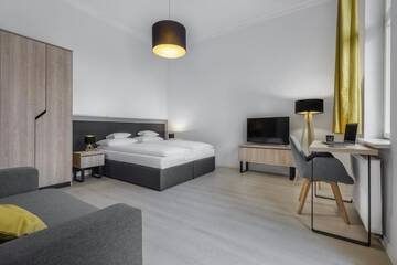 Фото номера Апартаменты с балконом Апарт-отели Aparthotel Platinum г. Щецин 4