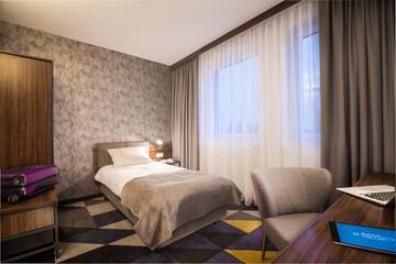 Фото номера Одноместный номер с ванной комнатой Отель Vulcan Hotel г. Щецин 8