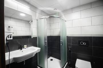 Фото номера Одноместный номер с ванной комнатой Отель Vulcan Hotel г. Щецин 7