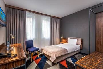 Фото номера Одноместный номер с ванной комнатой Отель Vulcan Hotel г. Щецин 3