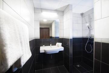Фото номера Трехместный номер Отель Vulcan Hotel г. Щецин 4
