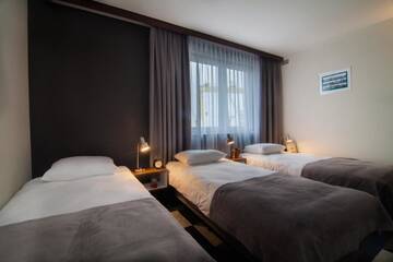 Фото номера Трехместный номер Отель Vulcan Hotel г. Щецин 5