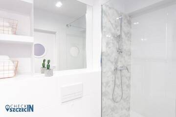 Фото номера Апартаменты с балконом Апартаменты Check in Szczecin г. Щецин 13