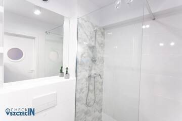 Фото номера Апартаменты с балконом Апартаменты Check in Szczecin г. Щецин 14