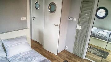 Фото номера Апартаменты с террасой Апартаменты Houseboat Porta Mare - Odradream г. Щецин 24