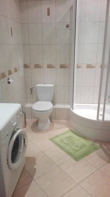 Фото номера Апартаменты с балконом Апартаменты Apartamenty Staromłyńska г. Щецин 8