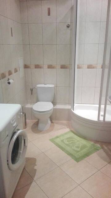Фото номера Апартаменты с балконом Апартаменты Apartamenty Staromłyńska г. Щецин 4