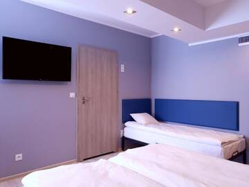 Фото номера Трехместный номер с ванной комнатой Хостелы Hostel Annamarie г. Щецин 4