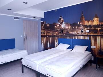 Фото номера Трехместный номер с ванной комнатой Хостелы Hostel Annamarie г. Щецин 6